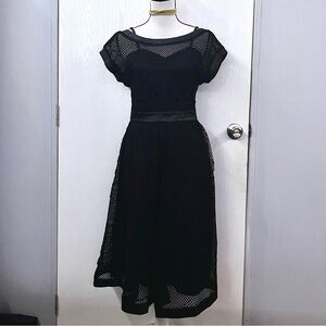 NWT Voodoo Vixen Black Fishnet Retro Dress
A1